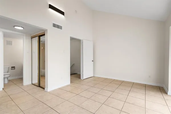 a view of an empty room and window