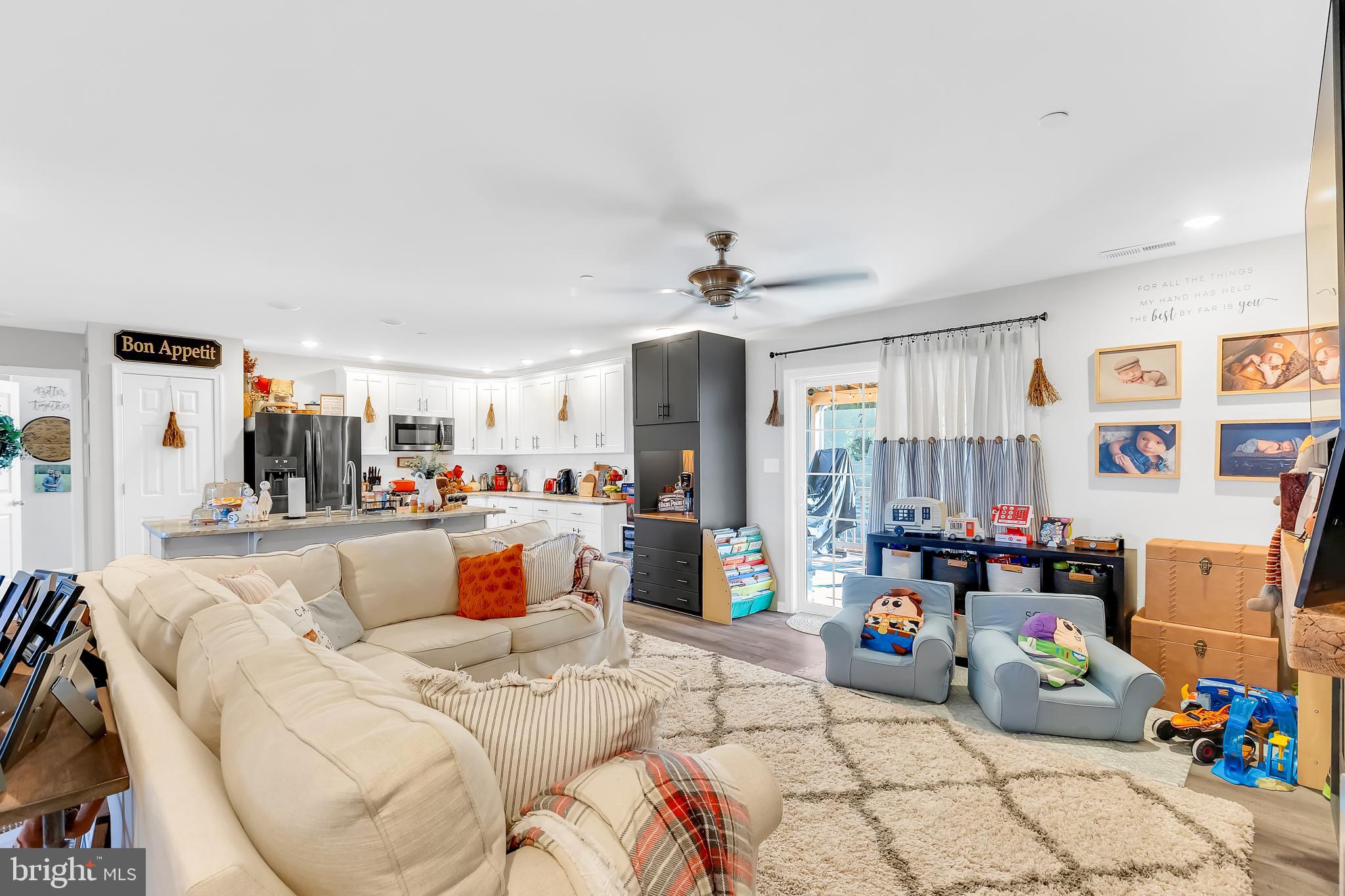 7829 New Hope Road Willards, MD 21874 - Photo 11 of 41 a living room with furniture and a table