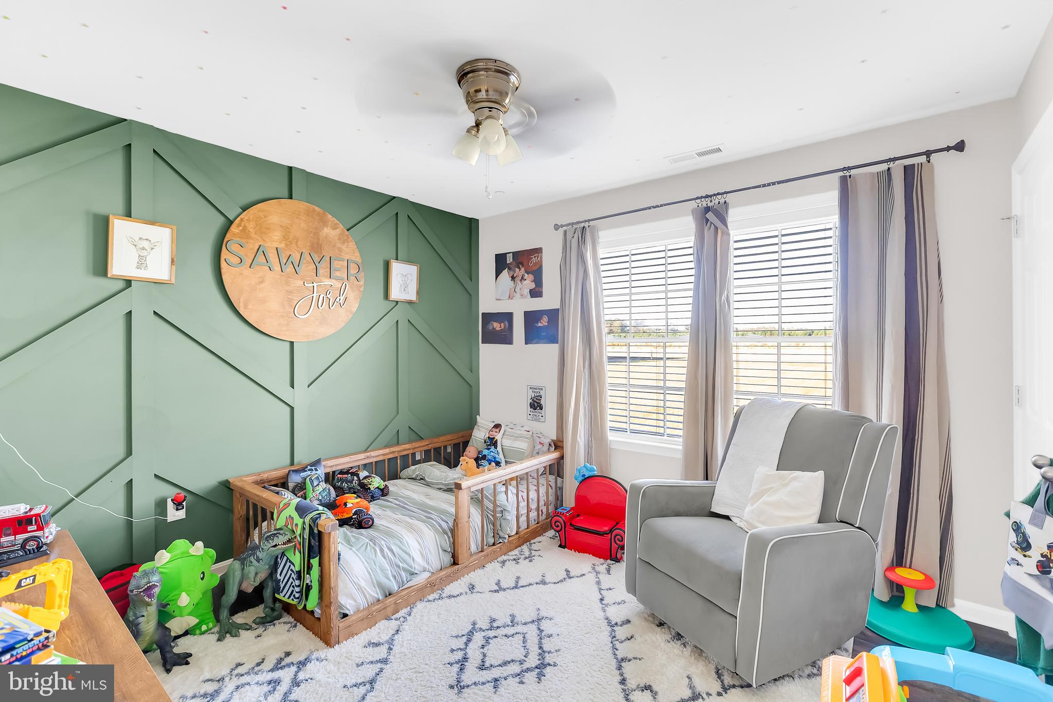 7829 New Hope Road Willards, MD 21874 - Photo 20 of 41 a living room with furniture and a window