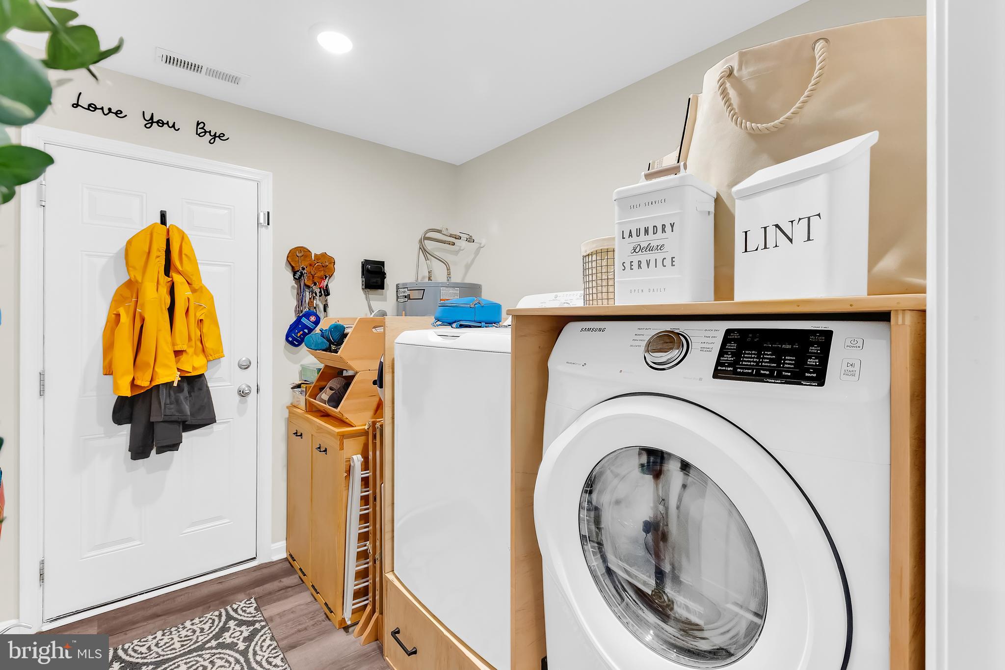 7829 New Hope Road Willards, MD 21874 - Photo 22 of 41 a utility room with dryer and washer
