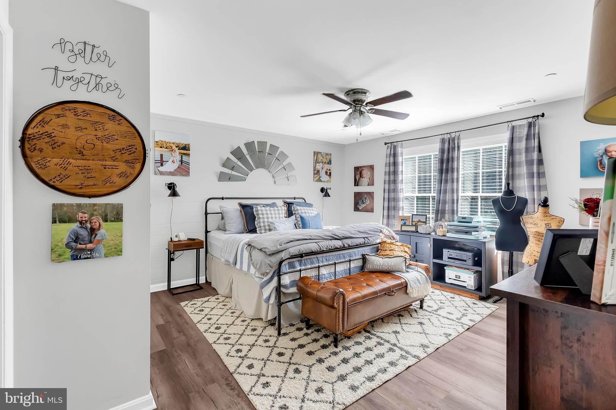 7829 New Hope Road Willards, MD 21874 - Photo 23 of 41 a living room with furniture a rug and a large window