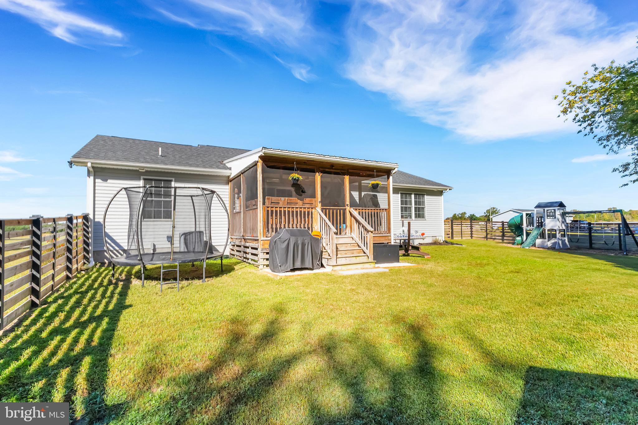 7829 New Hope Road Willards, MD 21874 - Photo 34 of 41 a view of a house with pool and sitting area