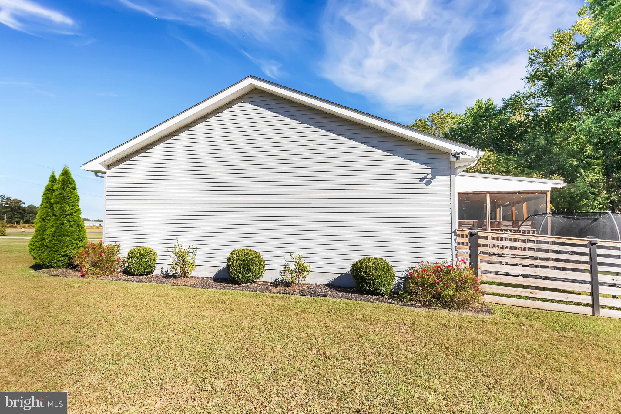7829 New Hope Road Willards, MD 21874 - Photo 40 of 41 a front view of a house with garden