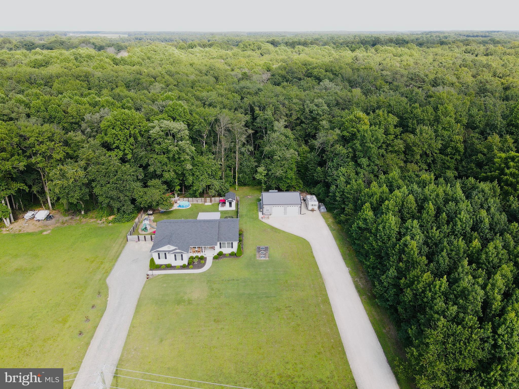 7829 New Hope Road Willards, MD 21874 - Photo 4 of 41 a view of a swimming pool with a yard