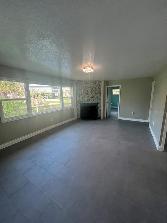 7222 Tropical Drive Weeki Wachee, FL 34607 - Photo 15 of 23 an empty room with windows