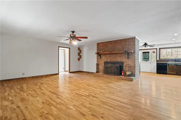 a kitchen with a stove and a microwave