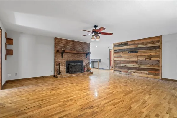a kitchen with stainless steel appliances granite countertop a sink and a stove top oven