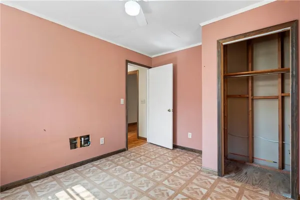 a kitchen with a sink cabinets and a stove