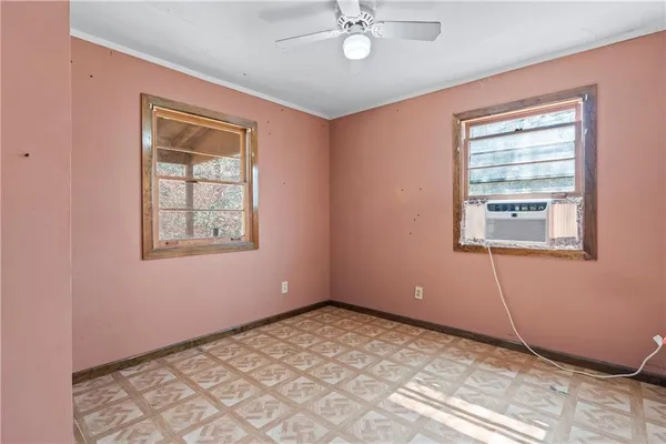 a bathroom with a mirror a sink and a mirror