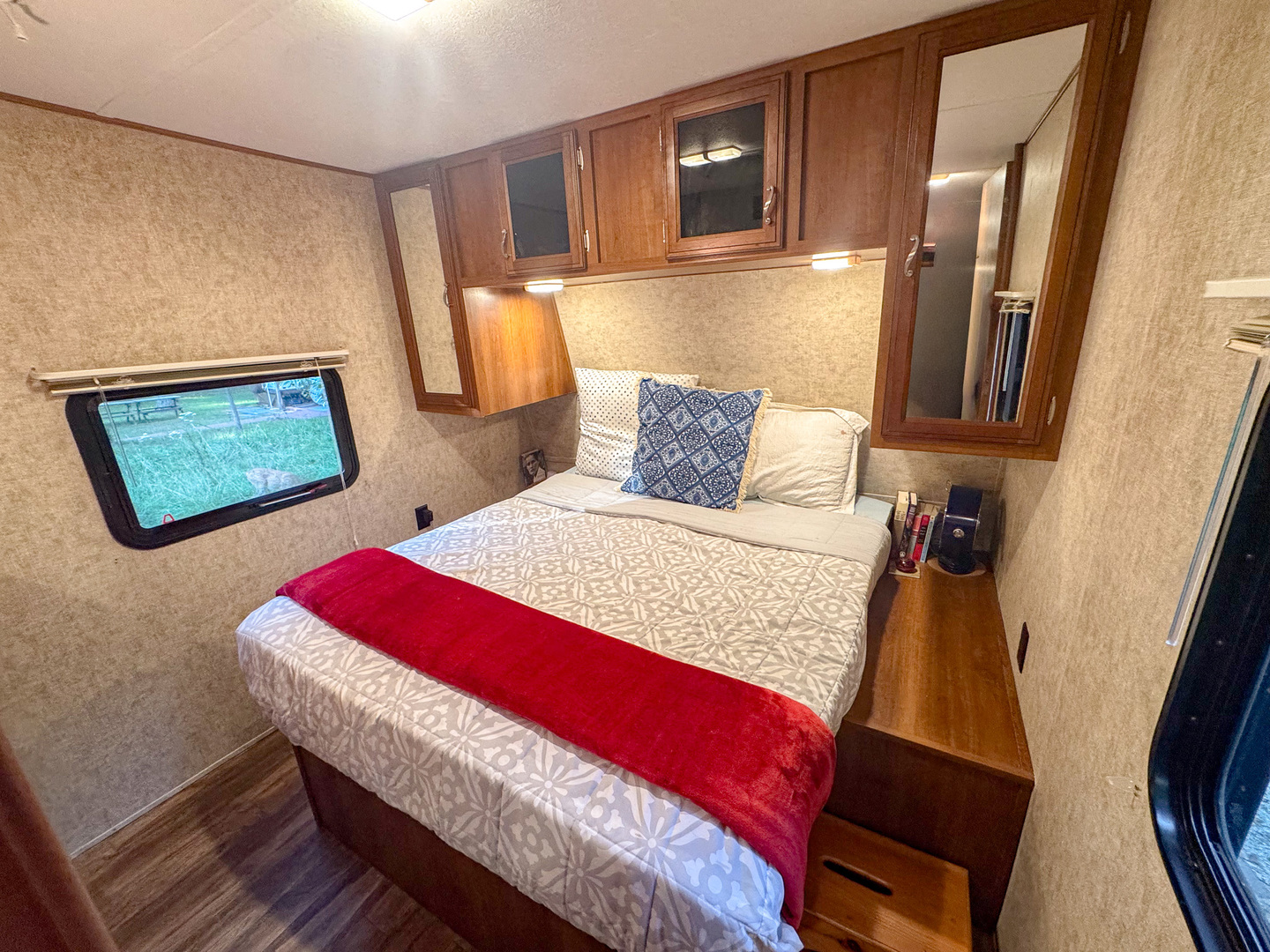 4-176 Woodhaven Sublette, IL 61367 - Photo 15 of 19 a bedroom with a bed and cupboard