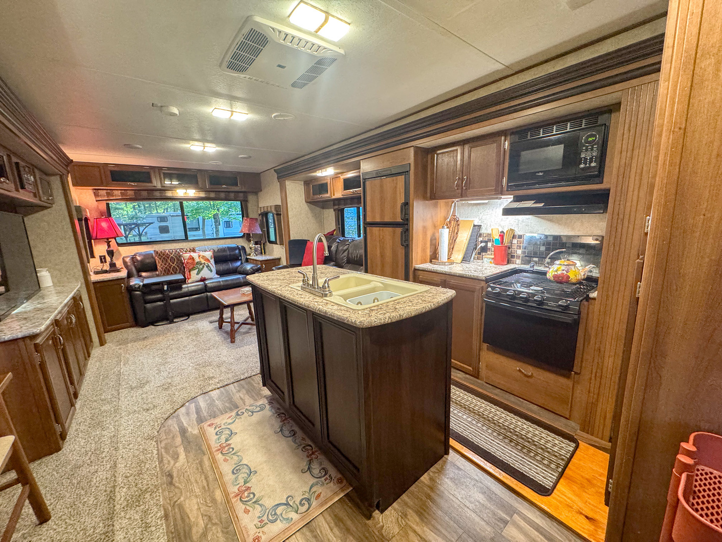 4-176 Woodhaven Sublette, IL 61367 - Photo 9 of 19 a kitchen with a sink stove and cabinets