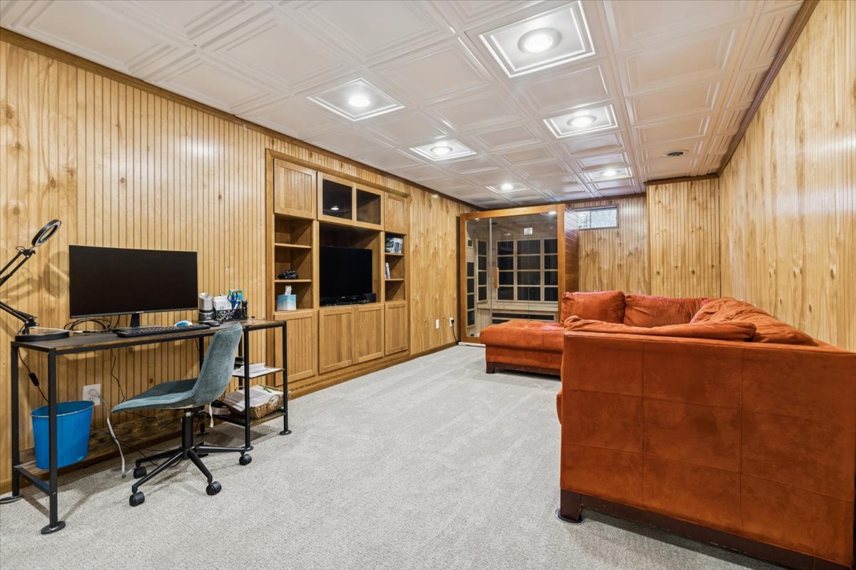 12641 Willow Lane Genoa, IL 60135 - Photo 21 of 29 a living room with furniture and a flat screen tv