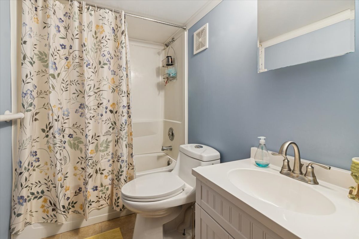 12641 Willow Lane Genoa, IL 60135 - Photo 23 of 29 a bathroom with a sink and a toilet
