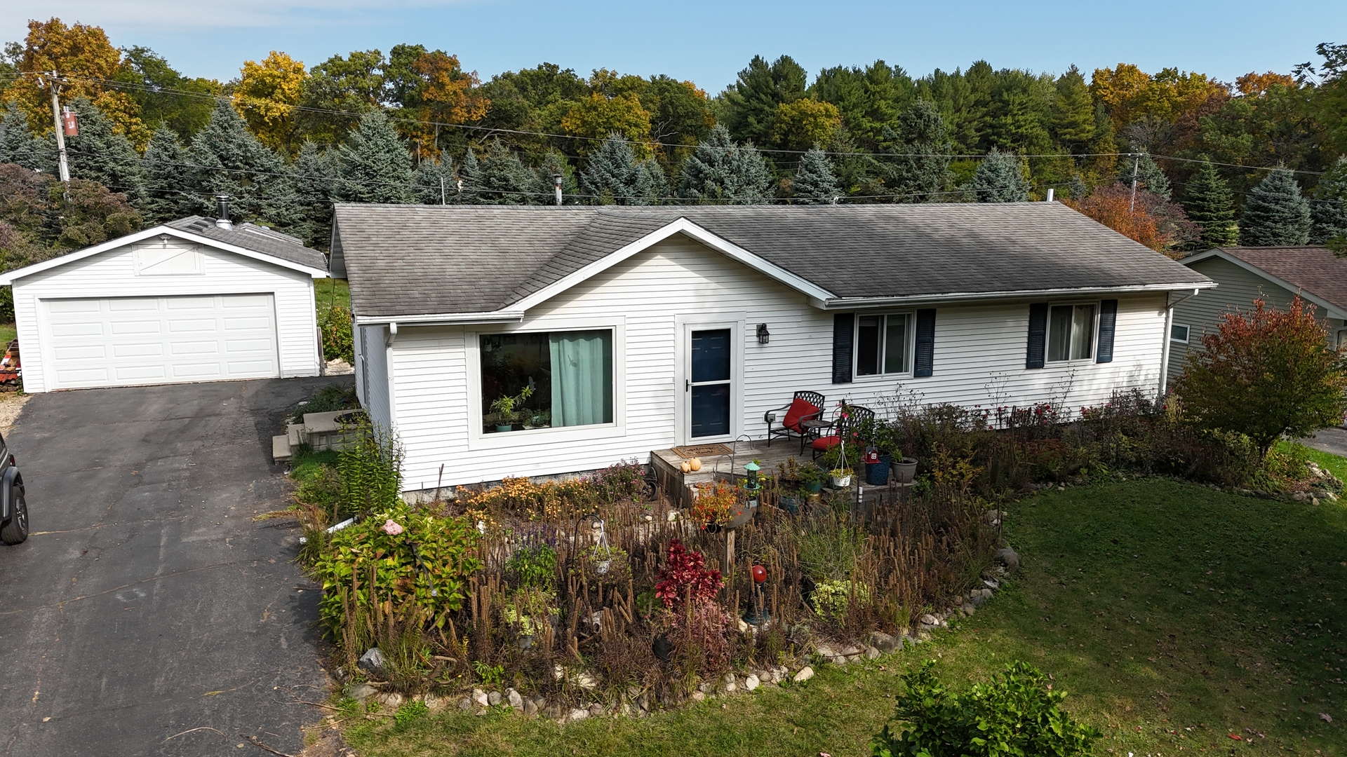 12641 Willow Lane Genoa, IL 60135 - Photo 26 of 29 a front view of a house with a yard