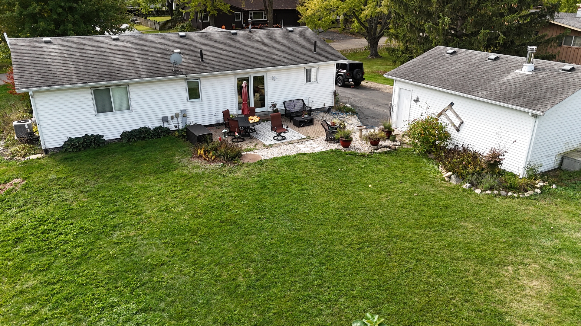 12641 Willow Lane Genoa, IL 60135 - Photo 28 of 29 a aerial view of a house with a yard patio and a patio