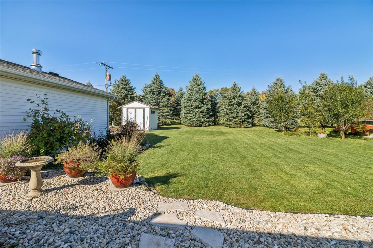 12641 Willow Lane Genoa, IL 60135 - Photo 5 of 29 a view of a garden with a house