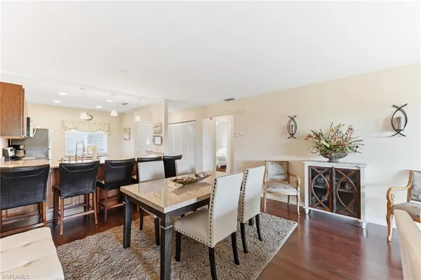 a view of a dining room with furniture