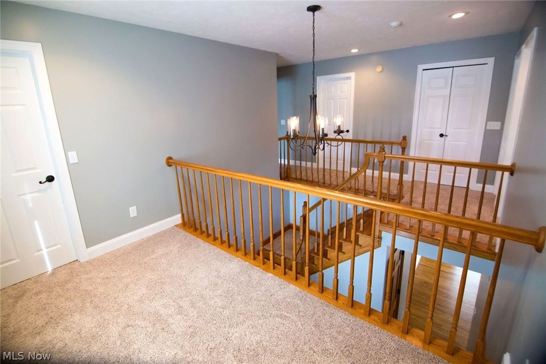 8627 Whipporwill Road Ravenna, OH 44266 - Photo 28 of 34 Separate loft connecting master and second bedroom. Very neat feature.