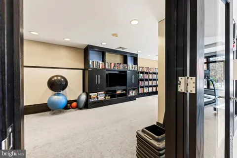 a room with furniture and a flat screen tv