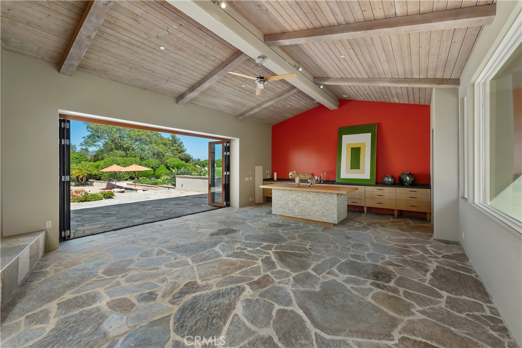6533 Lago Lindo Rancho Santa Fe, CA 92067 - Photo 48 of 57 a view of a porch and garden