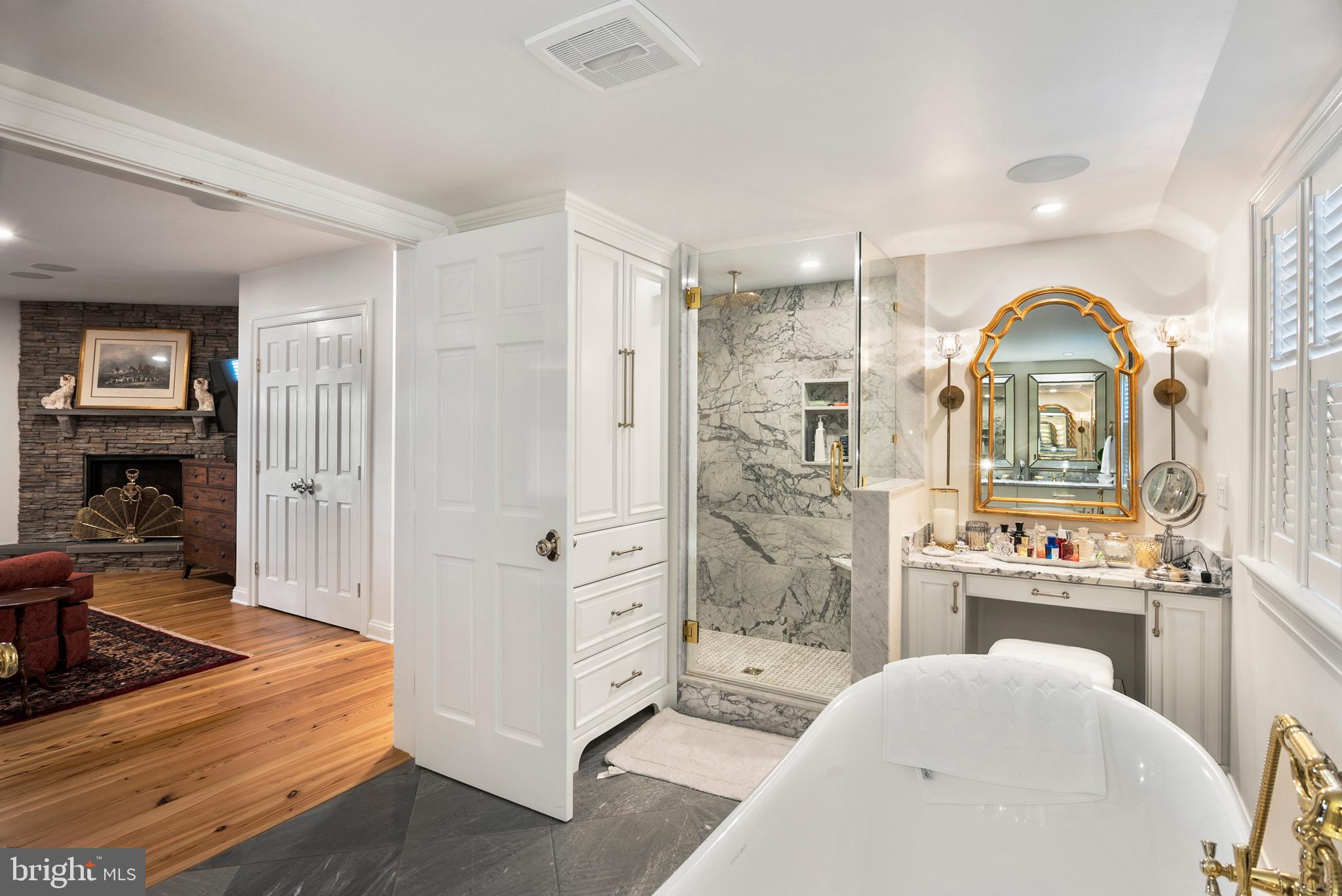 7989 Quaker Neck Road Chestertown, MD 21620 - Photo 31 of 90 a spacious bedroom with a bed and a view of bathroom