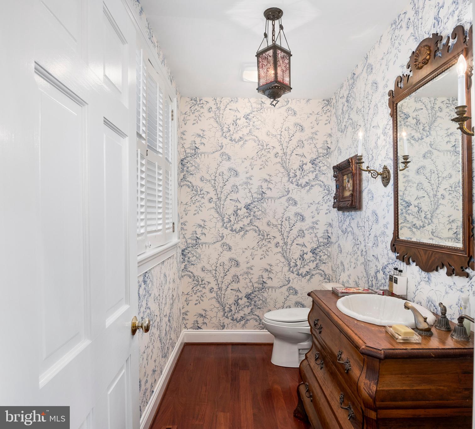 7989 Quaker Neck Road Chestertown, MD 21620 - Photo 33 of 90 a bathroom with a sink and a toilet