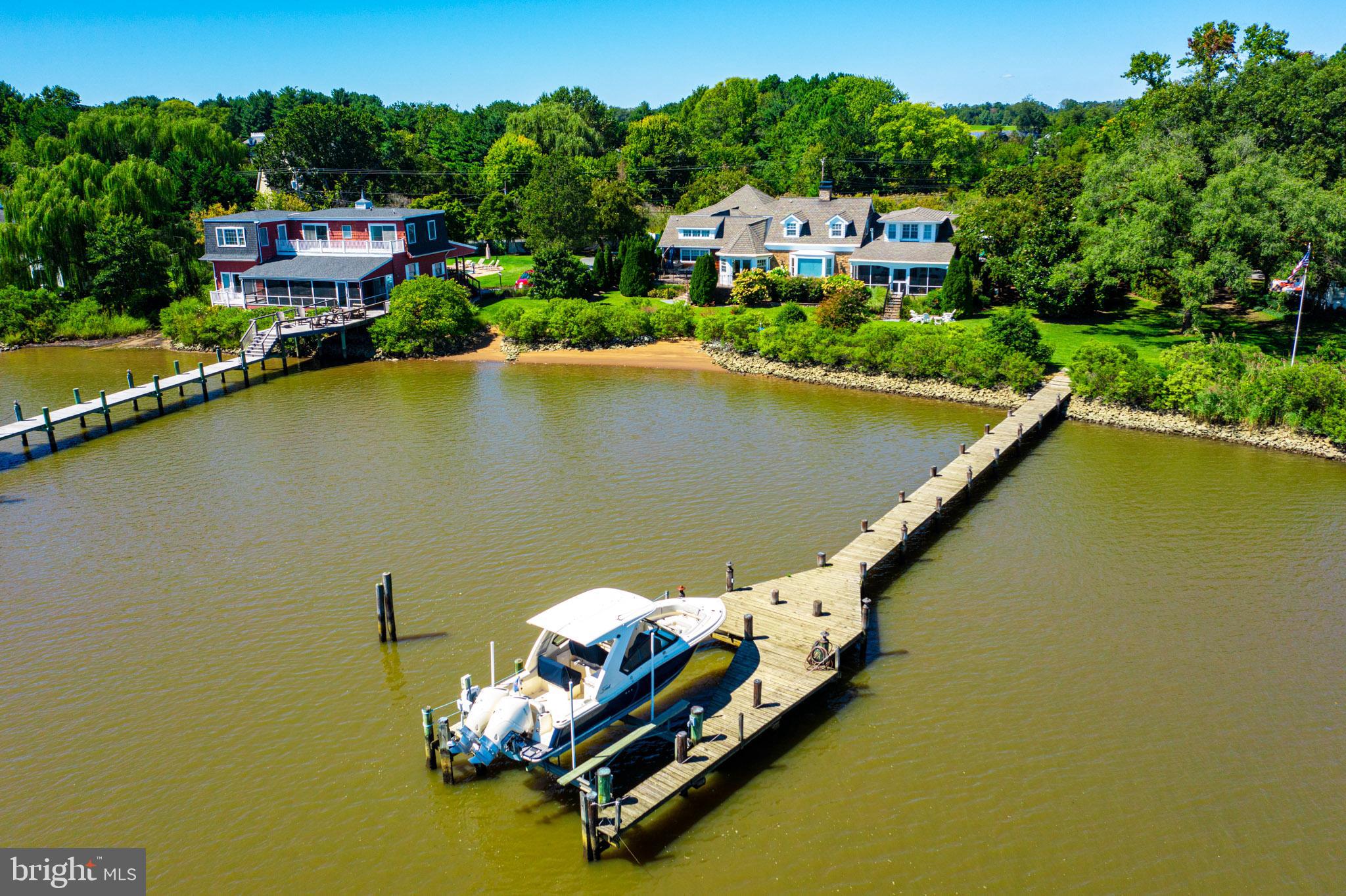 7989 Quaker Neck Road Chestertown, MD 21620 - Photo 4 of 90 a view of a house with outdoor space and lake view