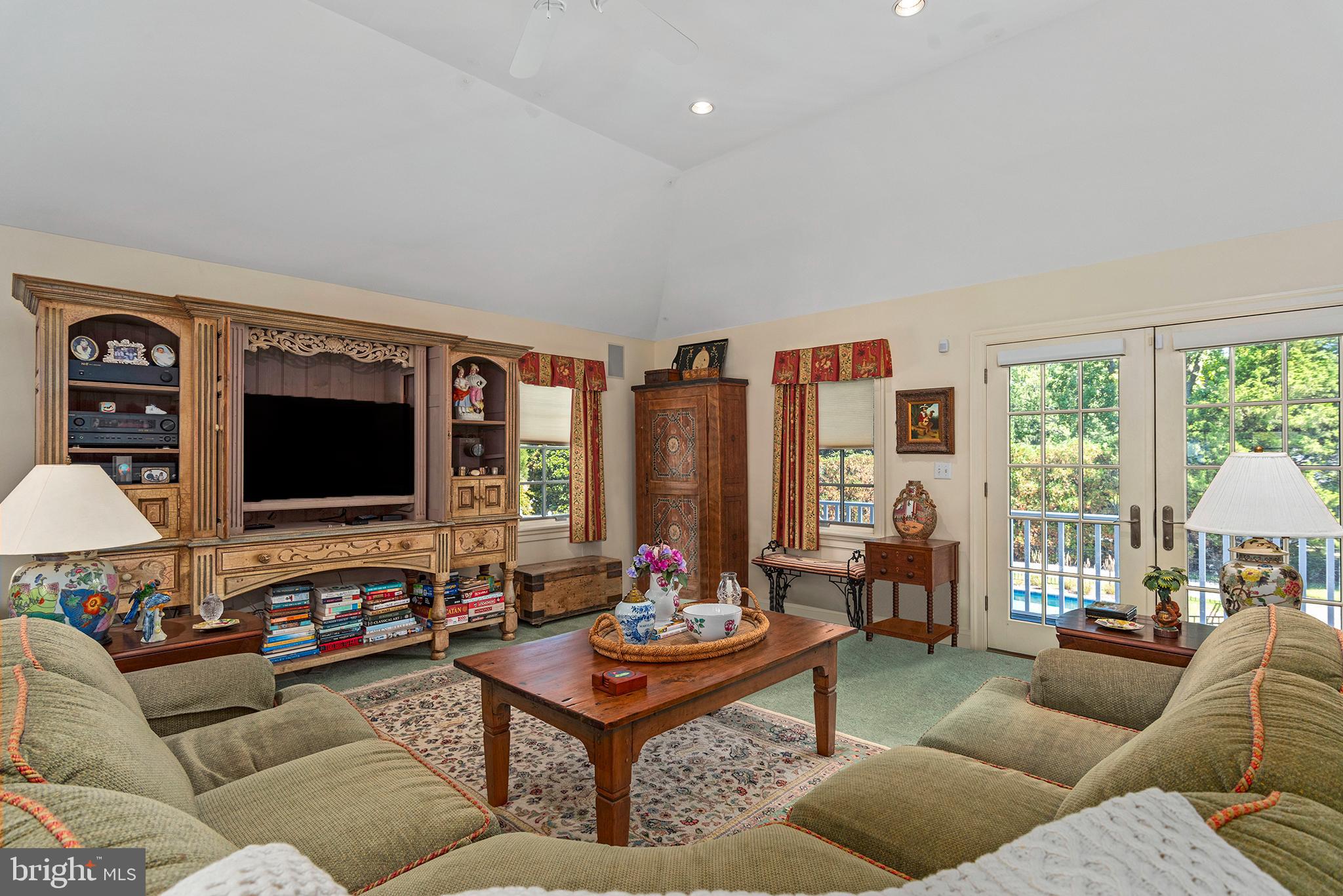 7989 Quaker Neck Road Chestertown, MD 21620 - Photo 68 of 90 a living room with furniture and a flat screen tv