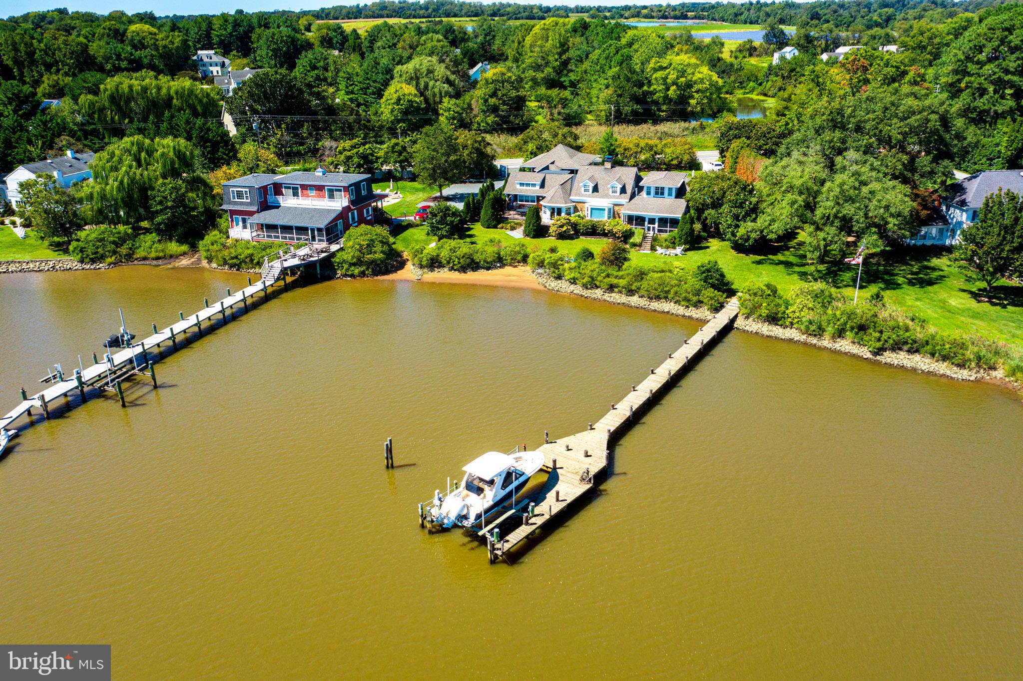 7989 Quaker Neck Road Chestertown, MD 21620 - Photo 71 of 90 an aerial view of a house with a swimming pool and outdoor space