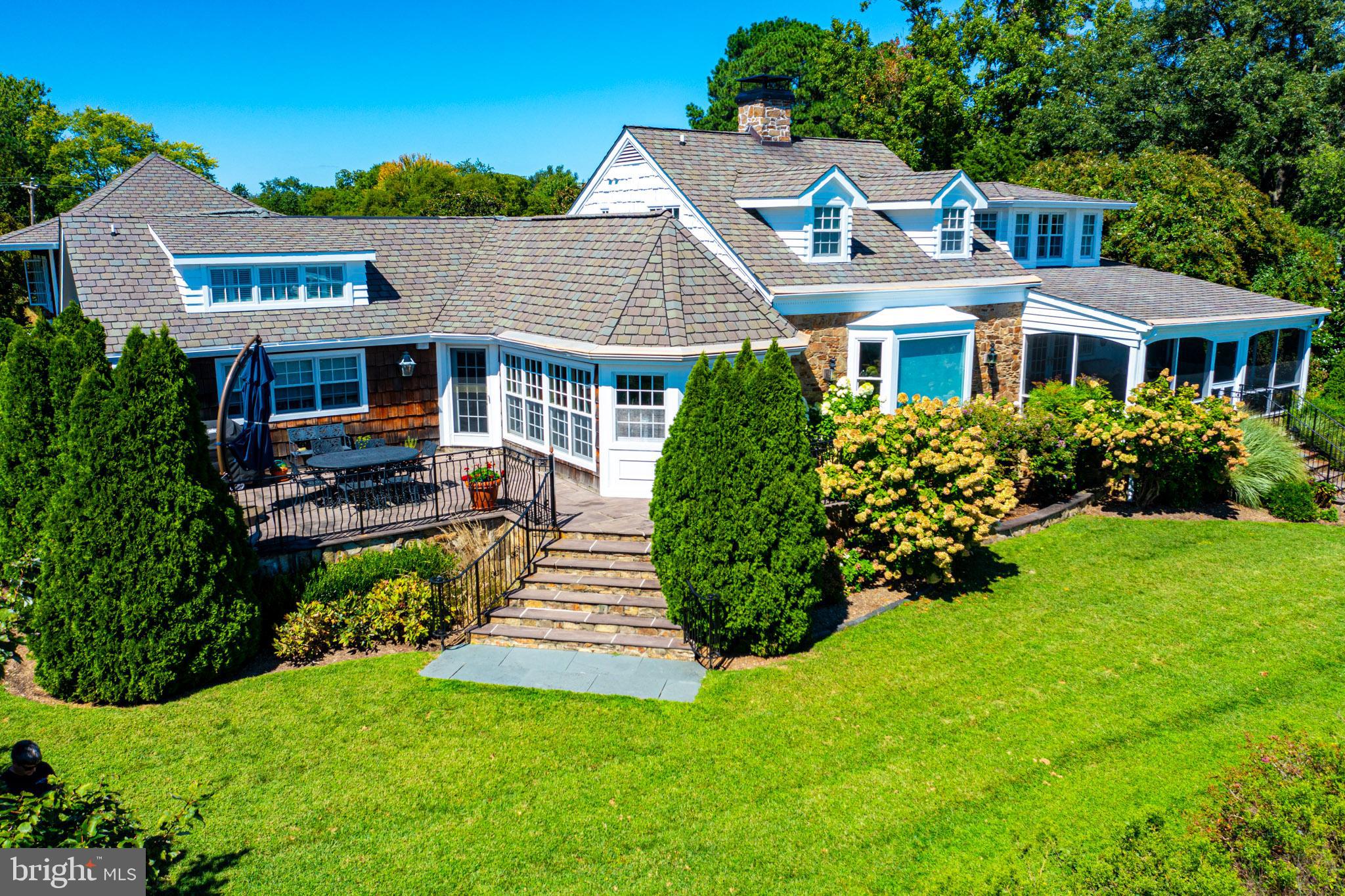 7989 Quaker Neck Road Chestertown, MD 21620 - Photo 86 of 90 a front view of a house with a garden