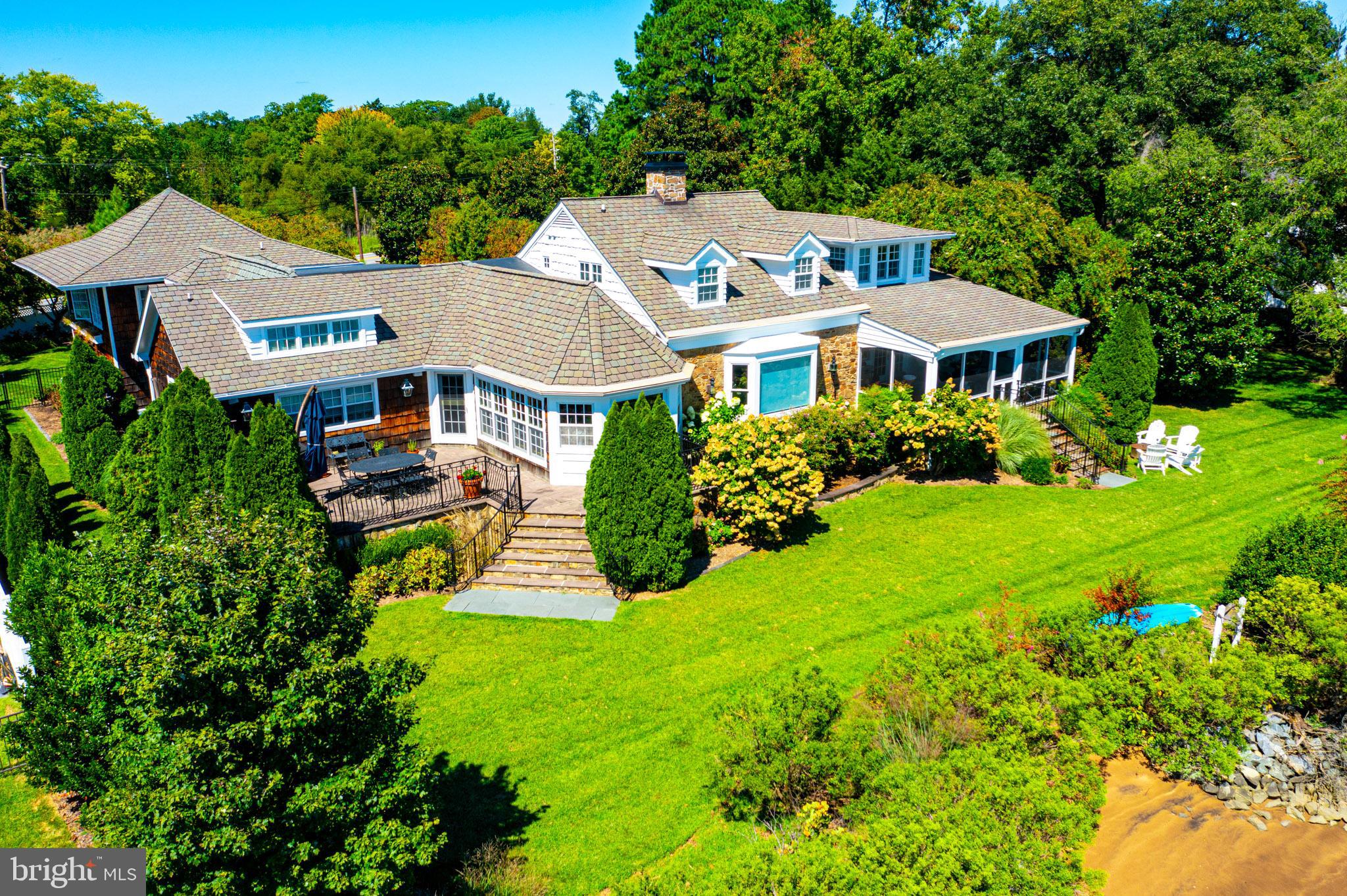 7989 Quaker Neck Road Chestertown, MD 21620 - Photo 88 of 90 a front view of a house with garden