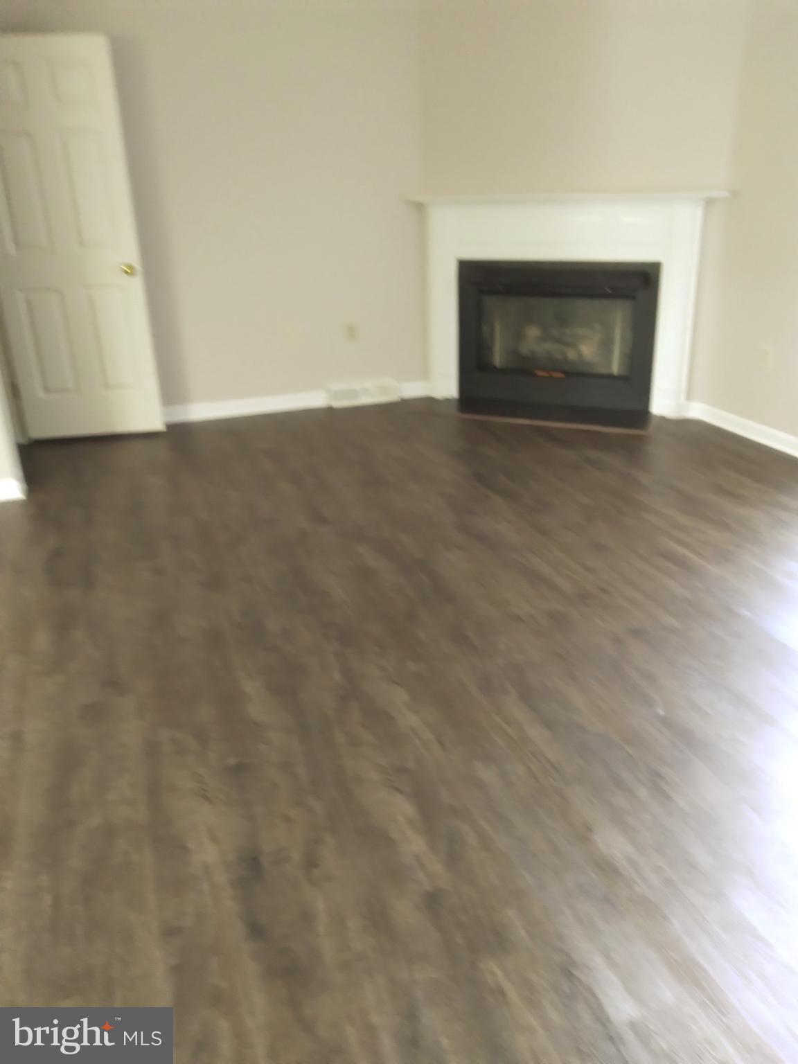 2017 C Raleigh Road Hummelstown, PA 17036 - Photo 12 of 13 Spacious room with a cozy fireplace.