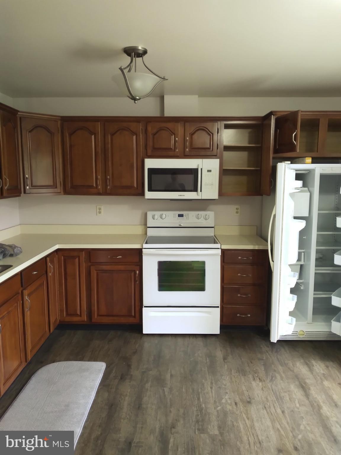 2017 C Raleigh Road Hummelstown, PA 17036 - Photo 9 of 13 Modern kitchen with warm wood cabinetry.