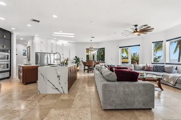 a kitchen with stainless steel appliances a stove microwave and cabinets