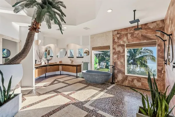 a view of a living room and bathroom