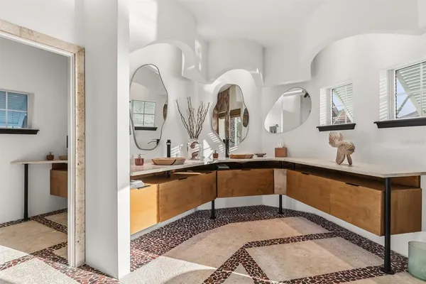 a utility room with sink dryer and washer
