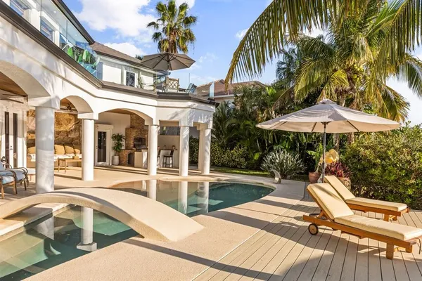 a bedroom with a bed and a walk in closet