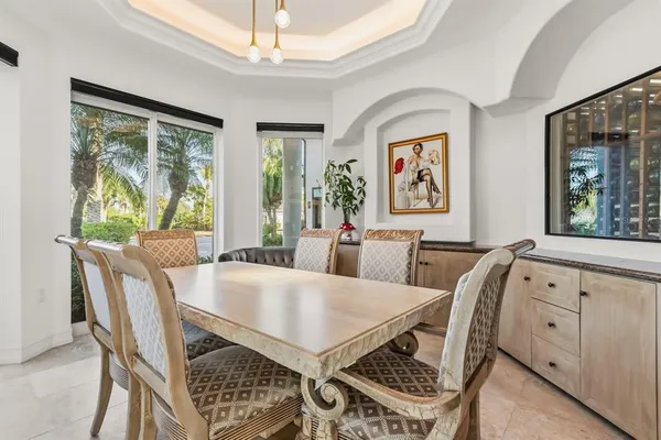 a living room with furniture and windows