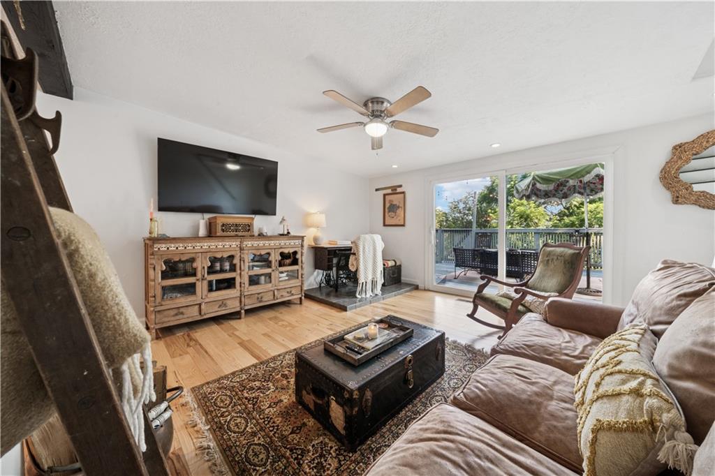 154 Henderson Street Pittsburgh, PA 15212 - Photo 11 of 31 a living room with furniture and a flat screen tv