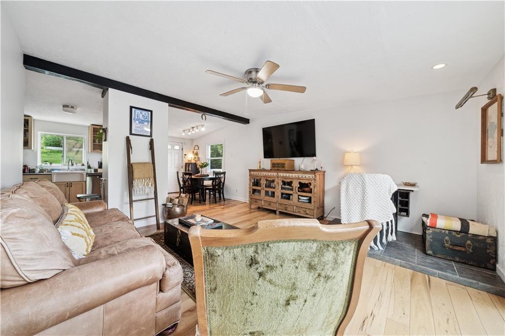 154 Henderson Street Pittsburgh, PA 15212 - Photo 12 of 31 a living room with furniture and a flat screen tv