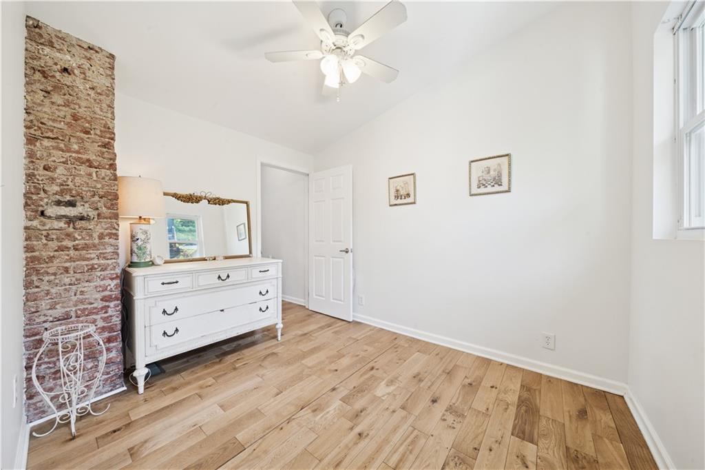 154 Henderson Street Pittsburgh, PA 15212 - Photo 21 of 31 a room with a dresser and a dresser