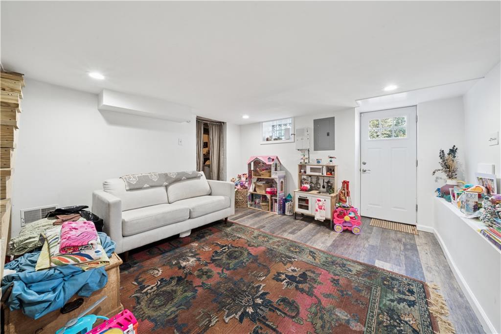 154 Henderson Street Pittsburgh, PA 15212 - Photo 23 of 31 a living room with furniture and a couch