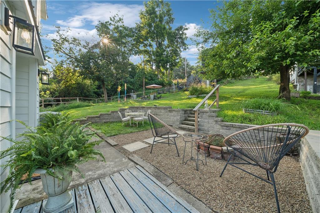 154 Henderson Street Pittsburgh, PA 15212 - Photo 4 of 31 a view of a chair and tables in the patio
