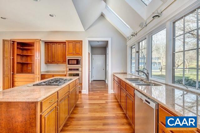 3690 Free Union Road Charlottesville, VA 22901 - Photo 13 of 41 a kitchen with stainless steel appliances granite countertop a stove and a sink