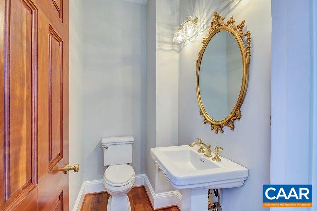 3690 Free Union Road Charlottesville, VA 22901 - Photo 18 of 41 a bathroom with a toilet sink and mirror