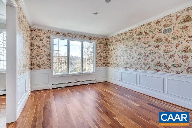 3690 Free Union Road Charlottesville, VA 22901 - Photo 9 of 41 a view of an empty room with wooden floor and a window