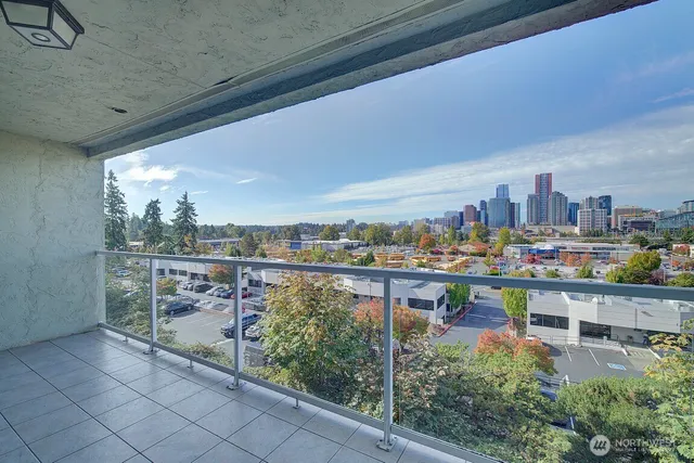 a living room with fireplace furniture and a window
