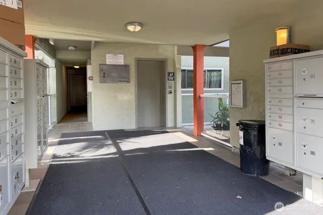a picture of a bathroom with a toilet and a shower