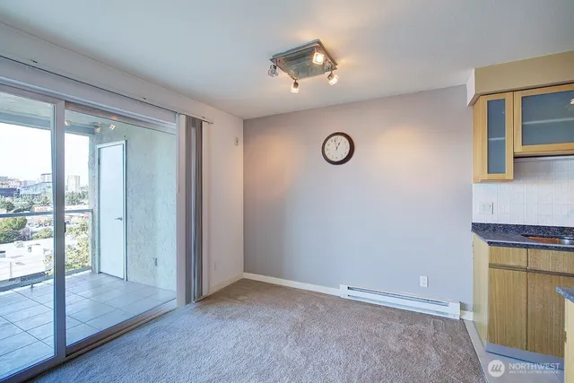a kitchen with a sink and a refrigerator