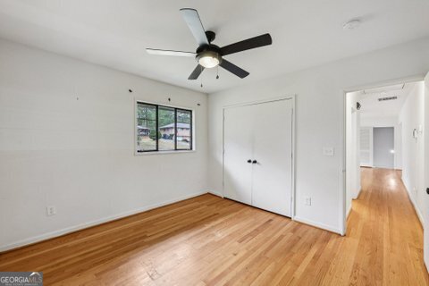2562 Farley Street East Point, GA 30344 - Photo 14 of 30 a view of empty room with wooden floor